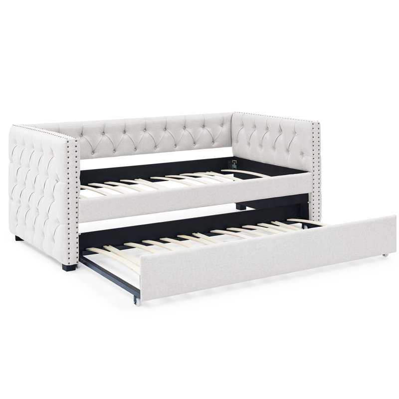 Lit de jour avec couchette en beige, revêtement, conception à accoudoirs carrés, rembourrage en mousse confortable, lit gigogne rembourré simple, revêtement en tissu beige, structure solide pour une utilisation à long terme