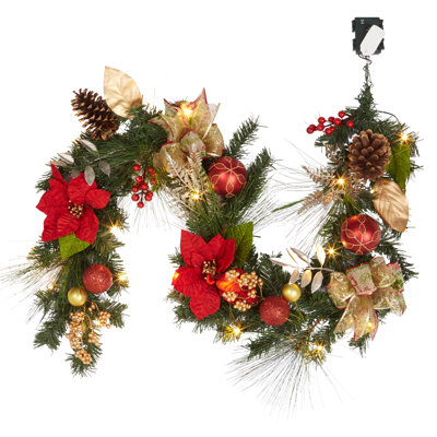 Guirlande de Noël de 1,80 m préilluminée, DEL blanc chaud, pommes de pin, poinsettias et nœuds, fonctionne sur piles, rouge et or