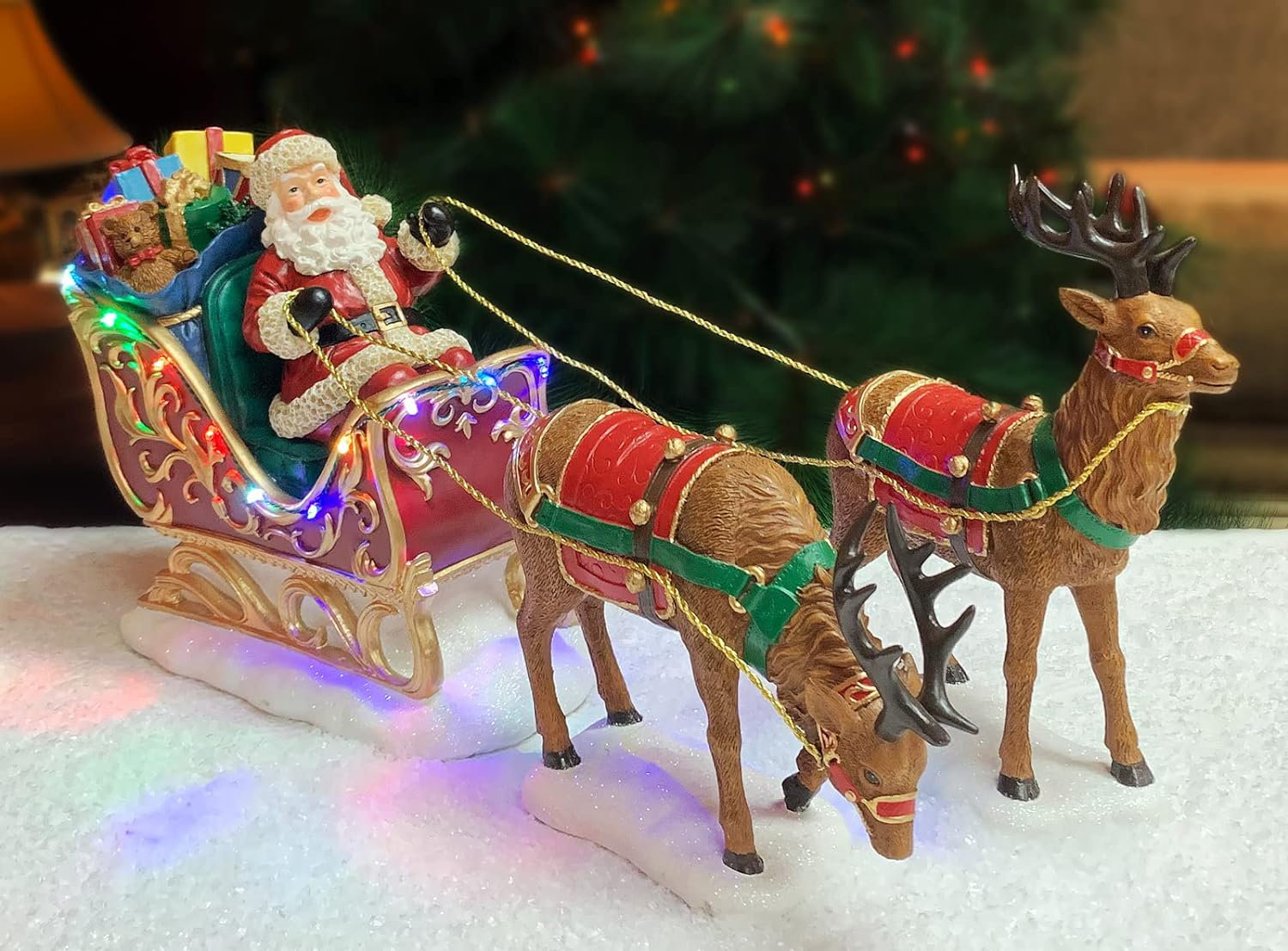 Moments in Time 9.5”H Santa Riding Sleigh w/ Reindeers LED Lights