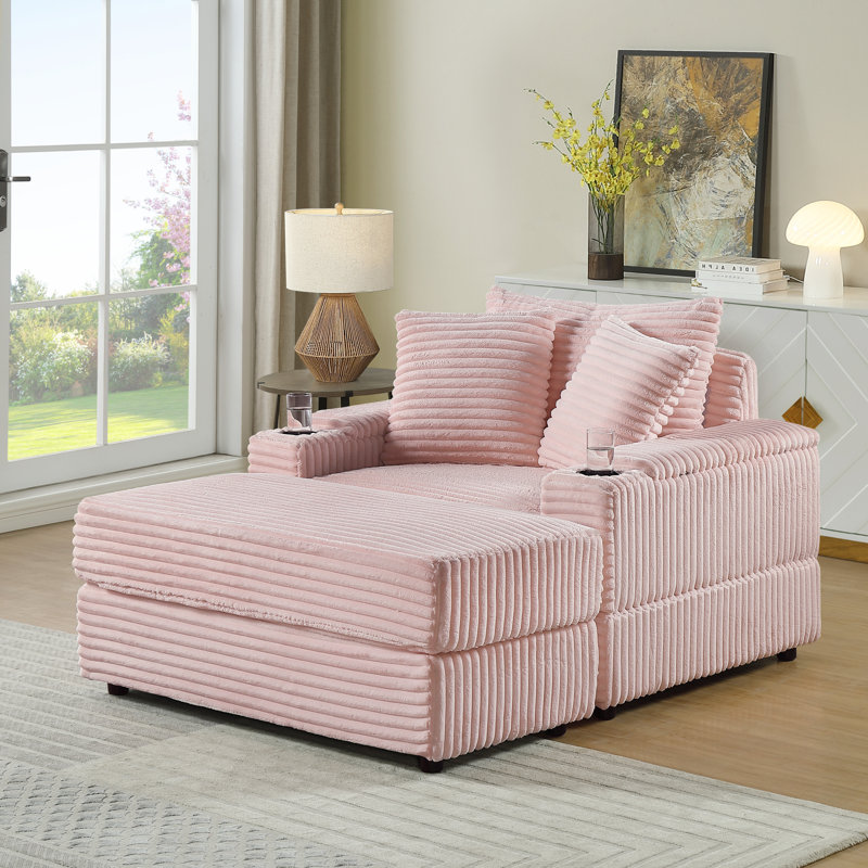 Canapé Comfy en velours côtelé rose avec 2 coussins décoratifs et repose-pieds