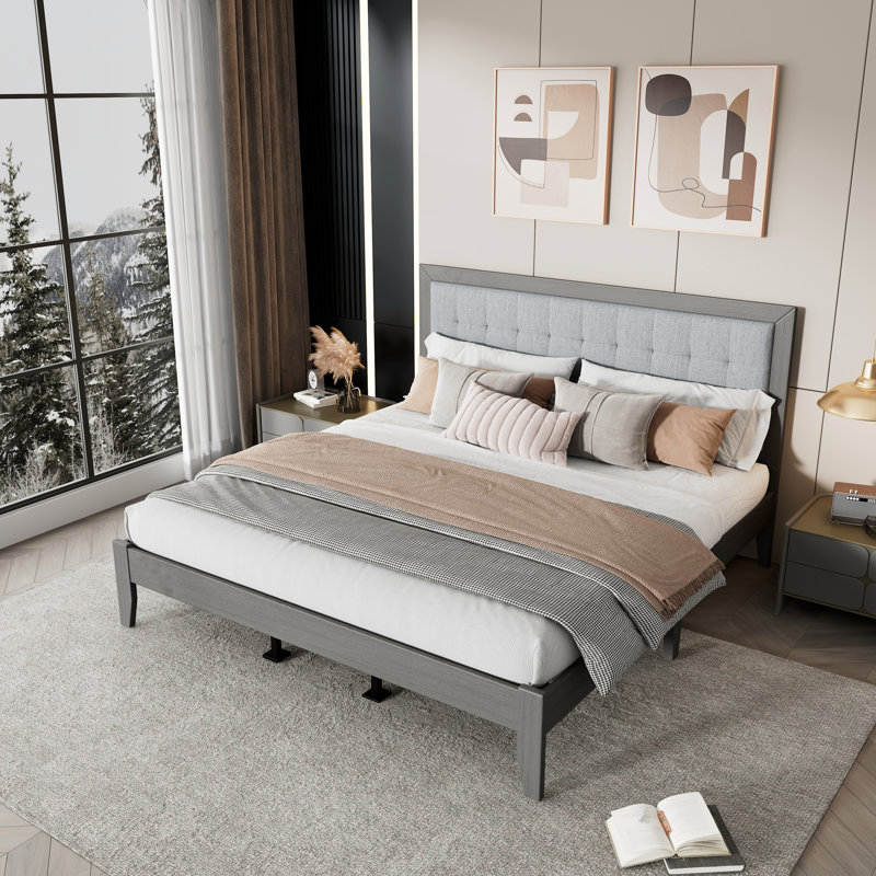 Lit plateforme en bois massif avec tête de lit tapissier, idéal pour différents styles de chambre à coucher et confort durable