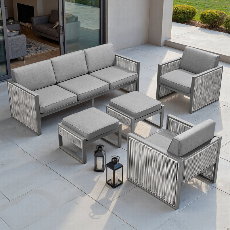 Ensemble de patio d'extérieur en osier 5 pièces Trinie avec repose-pieds et coussins, Gris clair