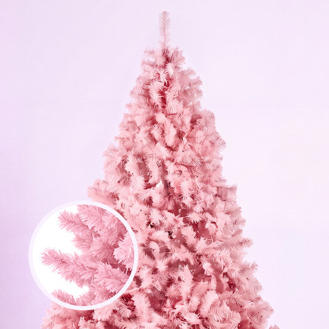 Light pink artificial Christmas tree with a detailed circular close-up inset showing needle texture.