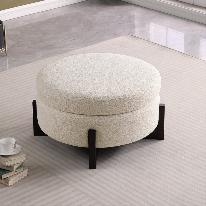 Pouf rond élégant avec rangement intérieur, pattes pliables en chêne, beige.