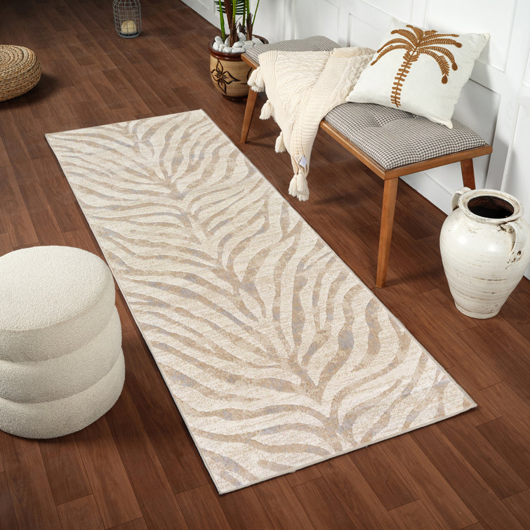Quamine Animal Print Area Rug