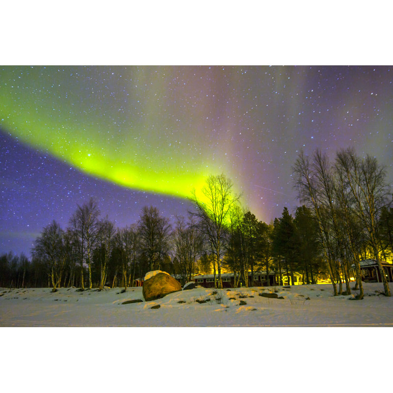 The Northern Lights Glowing Over The Snowscape by Meinzahn - Wrapped Canvas Print, 30cm H x 46cm W