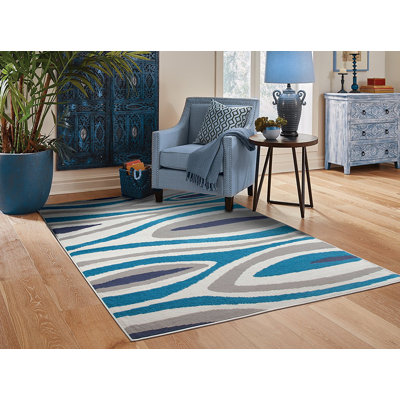Tapis intérieur/extérieur gris/bleu à motif feuille Costantini