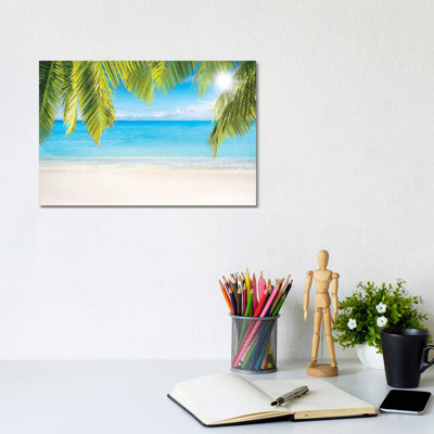 Sunny Beach With Palm Branches by Jan Becke - Wrapped Canvas Gallery-Wrapped Canvas Giclée