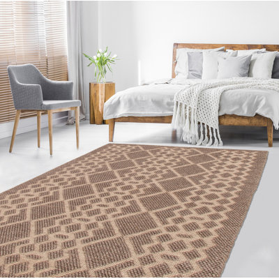 Tapis taupe en laine tressé à la main