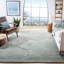 Tapis bleu clair en laine / coton touffeté à la main Moniz-1786537738