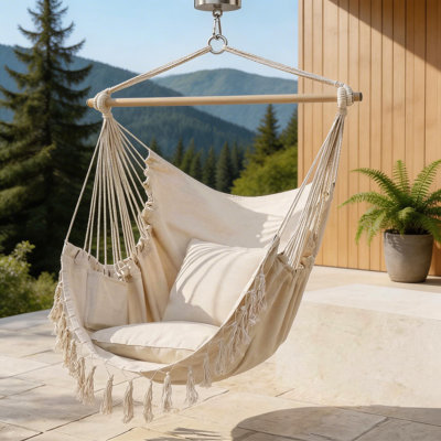 This Extra-Large Woven Hammock Chair Comes In A Versatile And Stylish Beige Color. It Features Double Seat Cushions And Storage Pockets, A 500-Pound Weight Capacity, And All Necessary Hardware For Hassle-Free Installation.