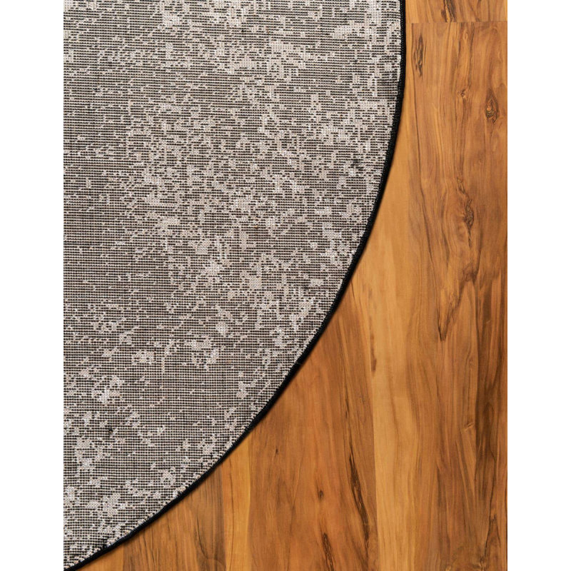 Round Anneliesse Ikat Onyx Area Rug