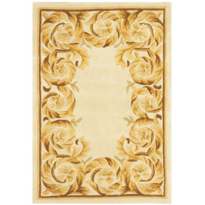 Lenora Handmade Wool Green/Brown Area Rug