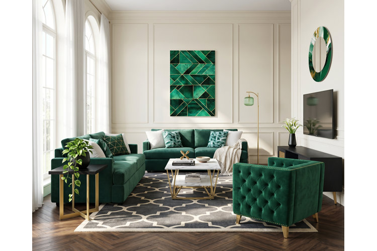 living room with emerald green sofas, accent chair, and wall art