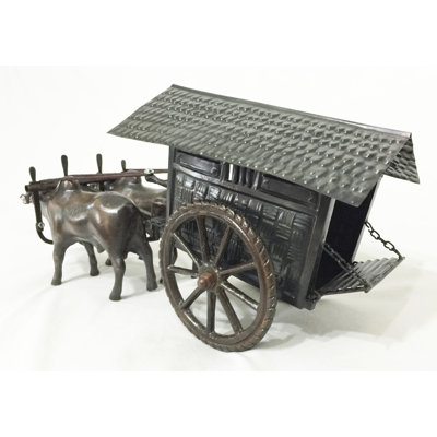 Figurine de vache avec chariot