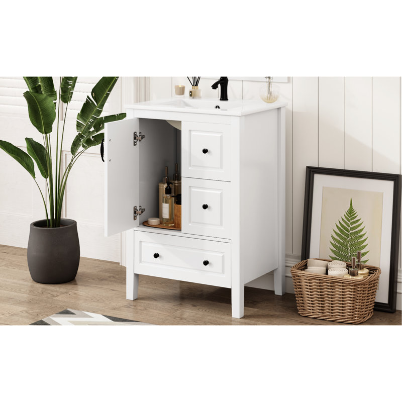 Meuble-lavabo blanc de 24 pouces avec lavabo en céramique lisse, armoire à fermeture en douceur et tiroirs, dossier ouvert pour une connexion simple à la plomberie