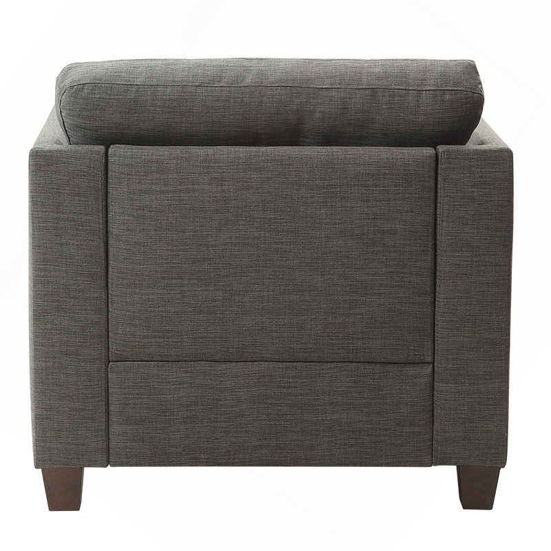 Chaise avec accoudoirs évasés gris clair et coussins décoratifs