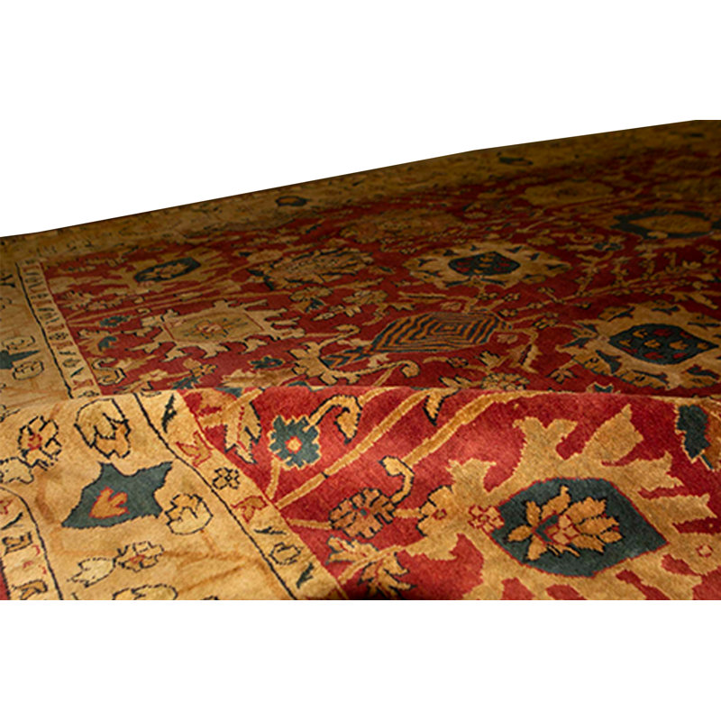 Tapis rouge et or de haute qualité noué à la main