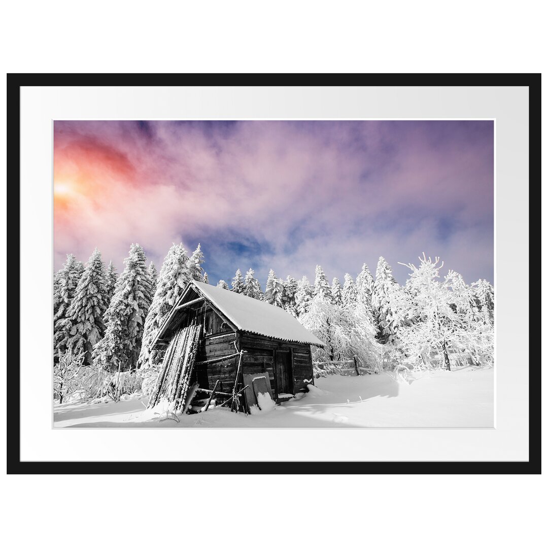 Gerahmtes Poster Holzhütte im Schnee