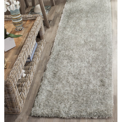 Chamiyah Shag Hand Tufted Performance Solid Color Rug