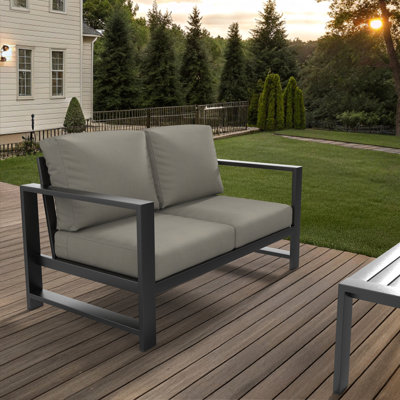 Causeuse d'extérieur Oltjana avec coussins Sunbrella®