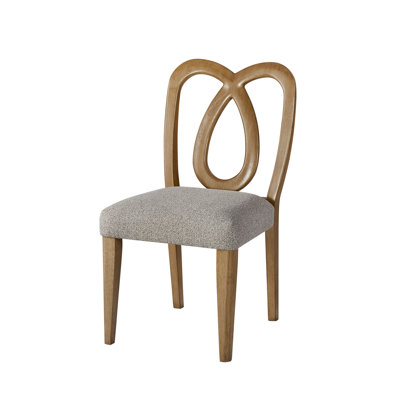 Chaise à dossier sculpté