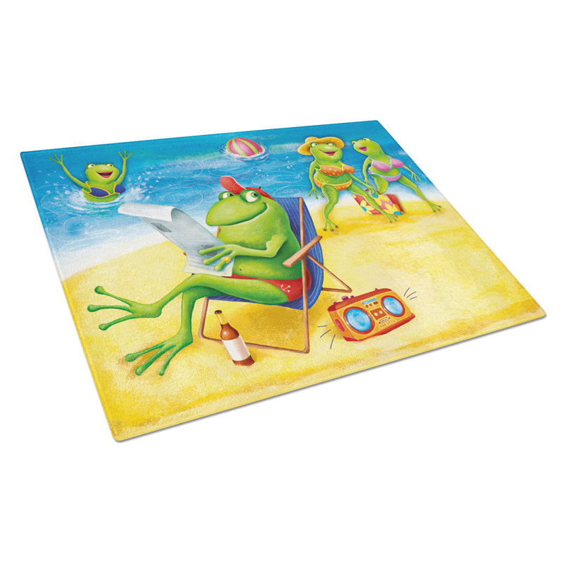 Grenouilles de mer en verre trempé de caroline sur la planche à découper