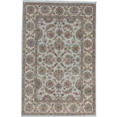 Tapis ivoire et doré de haute qualité noué à la main