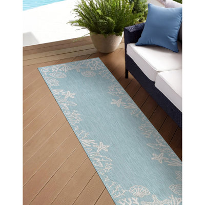 Tapis turquoise à imprimé animal Zendaya