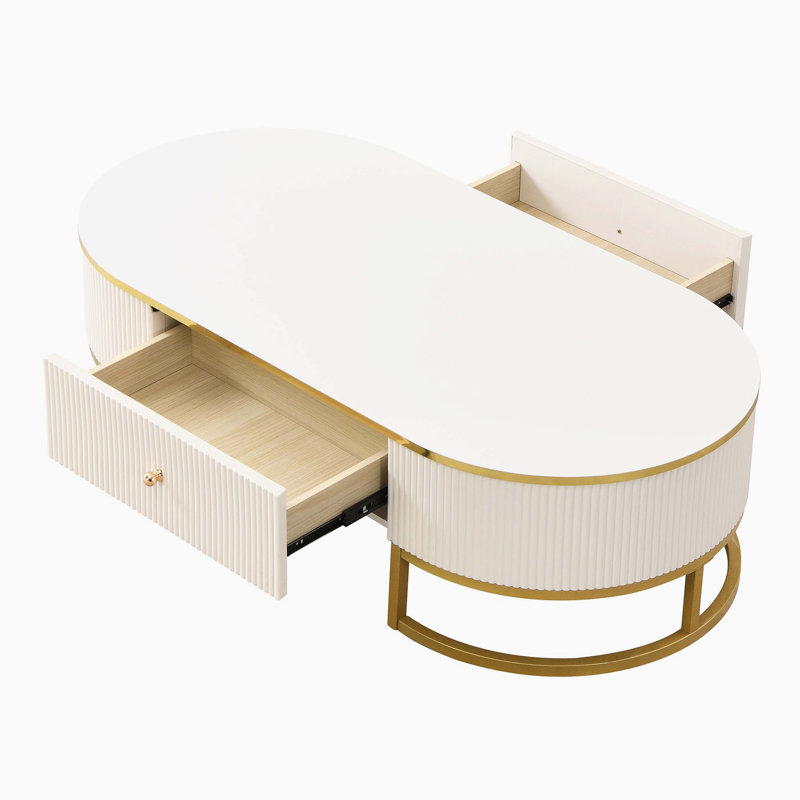 Table basse ovale avec tiroirs, design incurvé et décor en métal doré