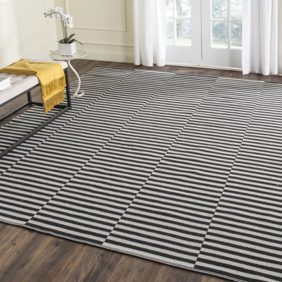 Tapis rayé ivoire / noir en coton tissé à plat Ilona