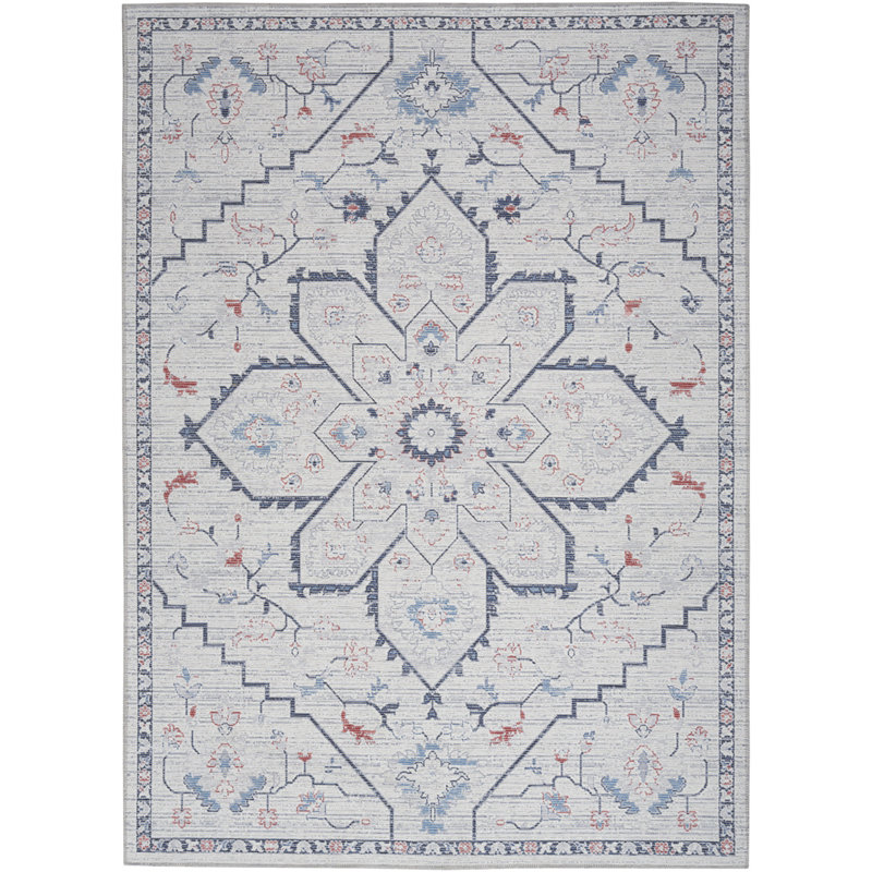Tapis oriental ivoire et bleu tissé à la machine 6 pi x 9 pi