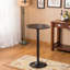 Table de bar ronde avec pieds et base en métal, jumelée à des tabourets de bar réglables en cuir reconstitué pour un ensemble de bar complet
