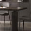 Table de salle à manger moderne en marbre noir minimaliste-105631660