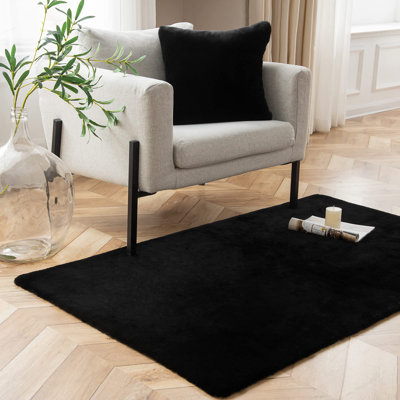 Tapis noir en fausse fourrure de couleur unie Daw