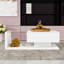 Table basse avec surface UV ultrabrillante-311168398