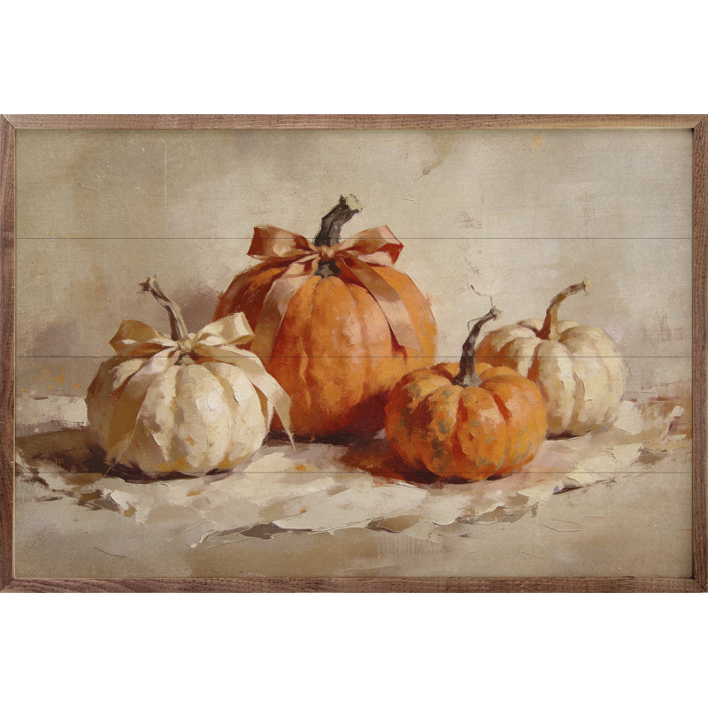 Citrouilles oranges avec des arcs, H 10 po x l 16 po