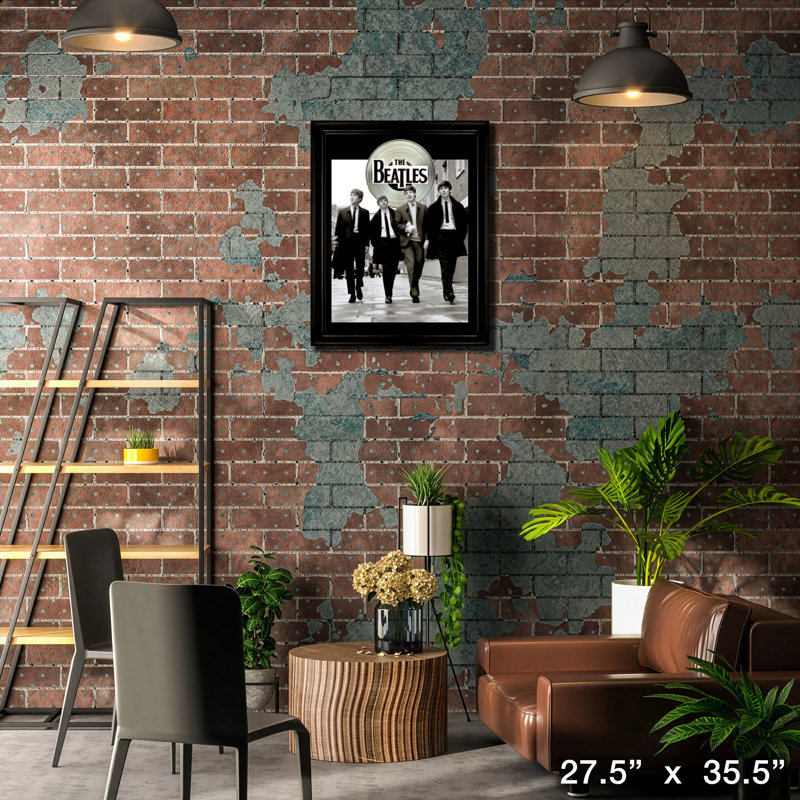 Les Beatles à Londres avec LP argenté