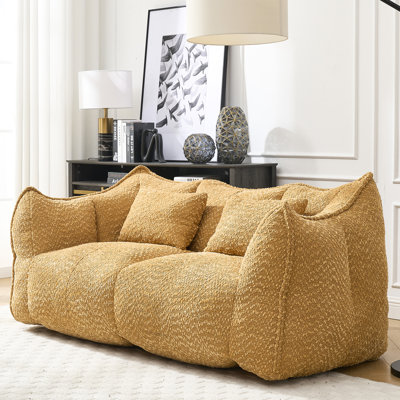 Grande chaise avec poignée pratique, facile à déplacer et à positionner, pour un moment de lecture relaxant