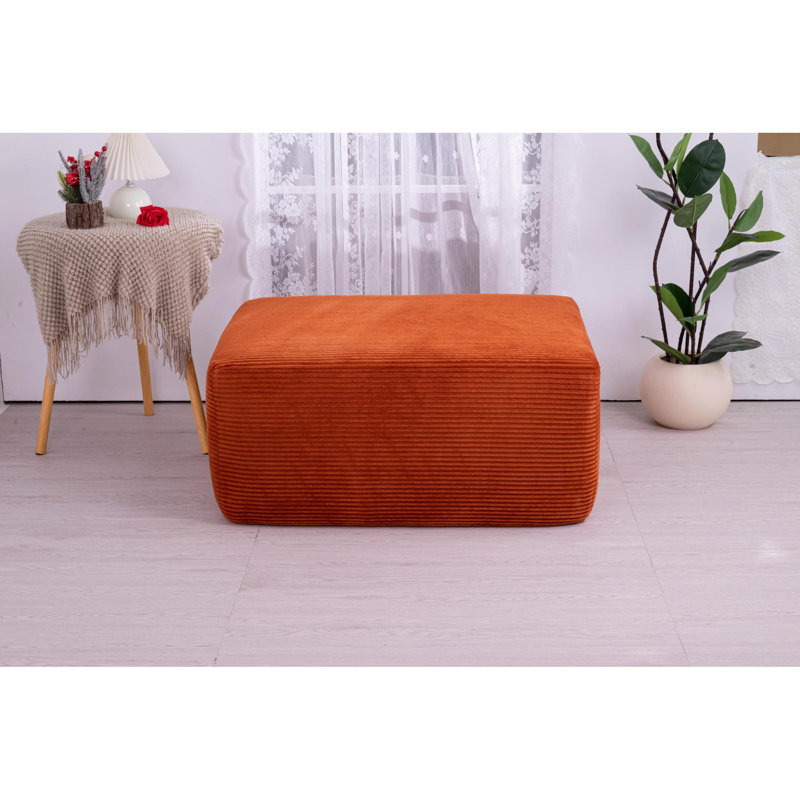 Repose-pieds polyvalent en velours côtelé orange, confort et style pour la maison
