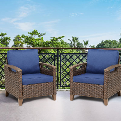 Ensemble de 2 chaises longues d'extérieur en osier brun avec coussins bleus pour véranda ou terrasse