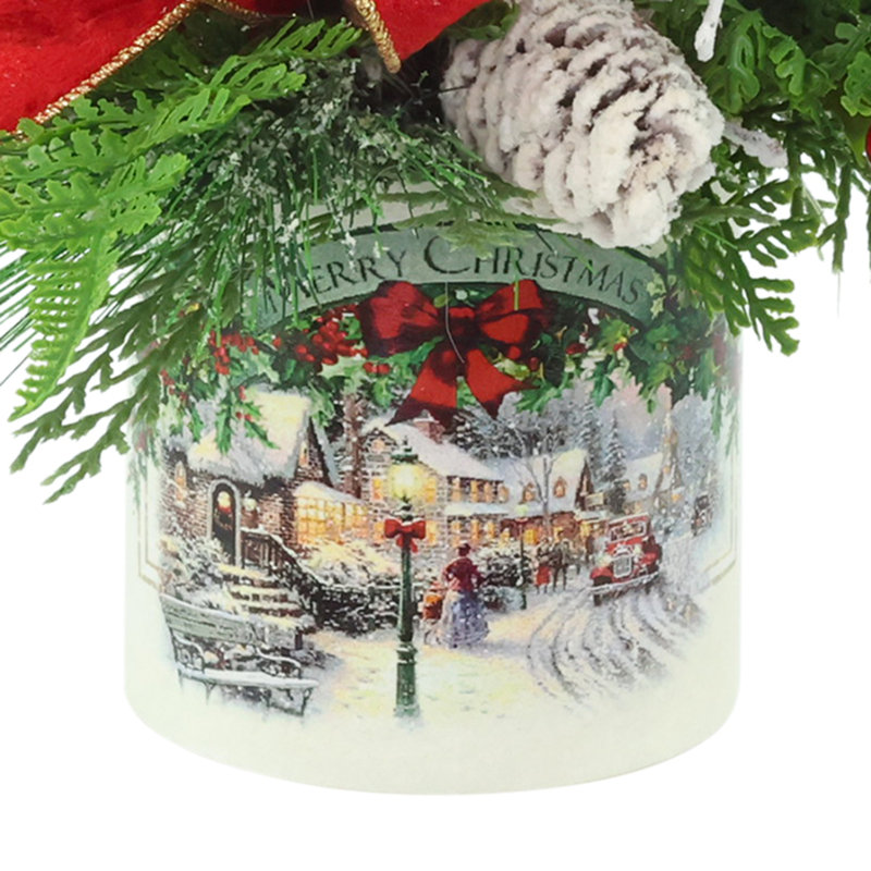 Festive holiday arrangement with greens and Berries