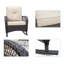Chaise berçante d'extérieur en rotin avec coussins