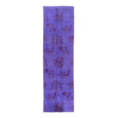 Weda Geometric Area Rug in Purple