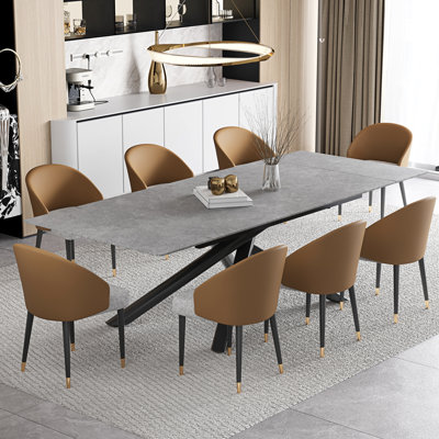 Ensemble de table de salle à manger extensible 102 po avec table en pierre frittée et 8 chaises en similicuir