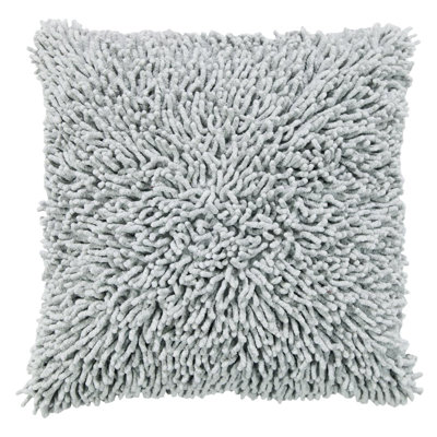 Coussin décoratif corail à poils longs 