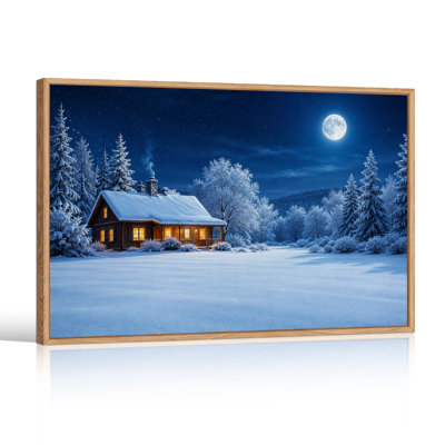 Cabane en bois enneigée avec des lumières chaudes aux fenêtres sous une toile murale d'Halloween