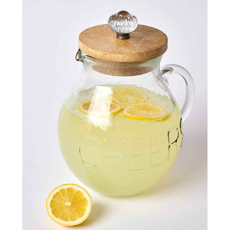 https://assets.wfcdn.com/im/73626163/resize-h755-w755%5Ecompr-r85/2225/222558219/Glass+Pitcher+With+Door+Knob+Lid.jpg