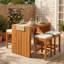 Ensemble de bar extérieur 5 pièces, table de patio en bois d'acacia et quatre tabourets avec coussins, ensemble de bar en bois pour la cour, le bord de la piscine et le balcon