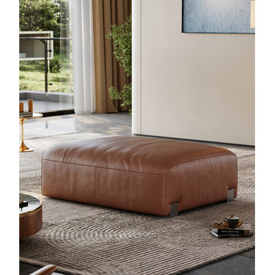 Repose-pieds en cuir brun